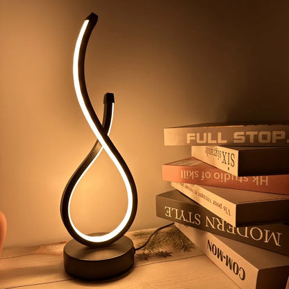 Modern Sculptural Table Lamp with Soft Ambient Light